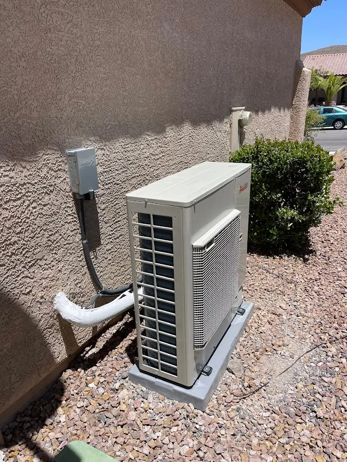 Residential air conditioning condenser unit in June Park